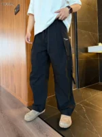 Мужские штаны Maison Margiela чёрного цвета, артикул 343454