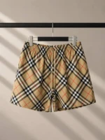 Мужские шорты Burberry бежевого цвета, артикул 345942