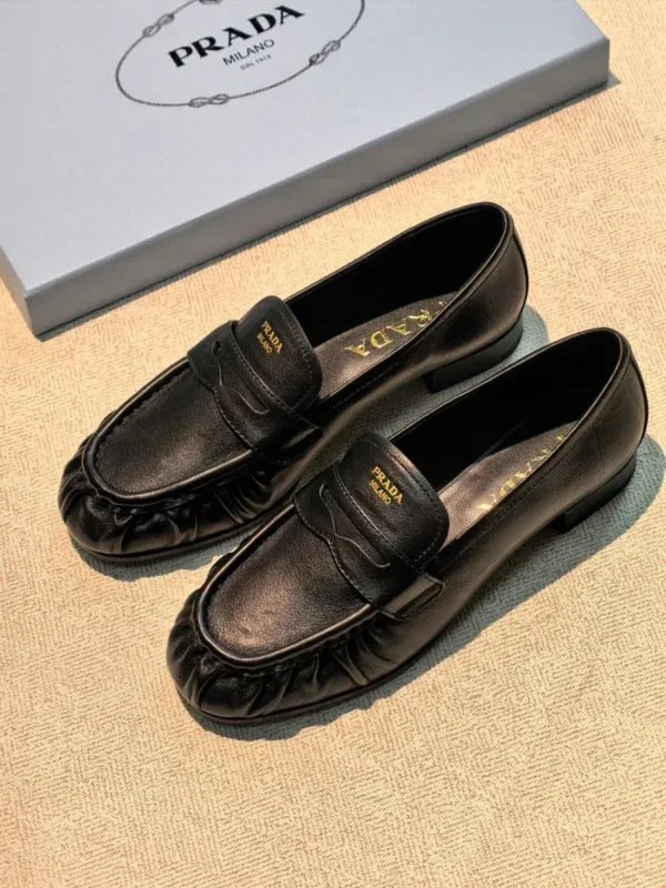 Лоферы Prada